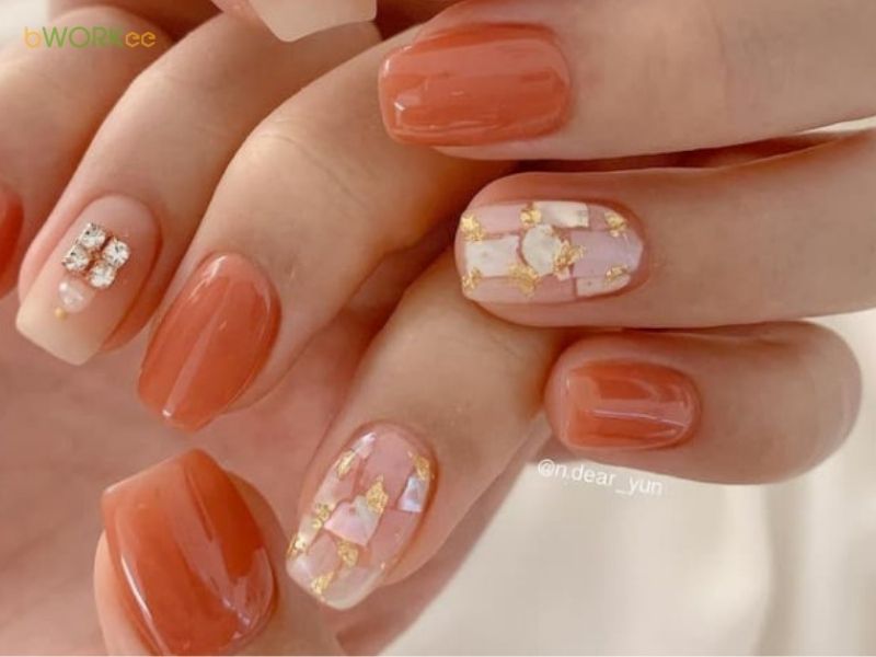Mẫu nail màu đỏ cam – Trẻ trung và năng động